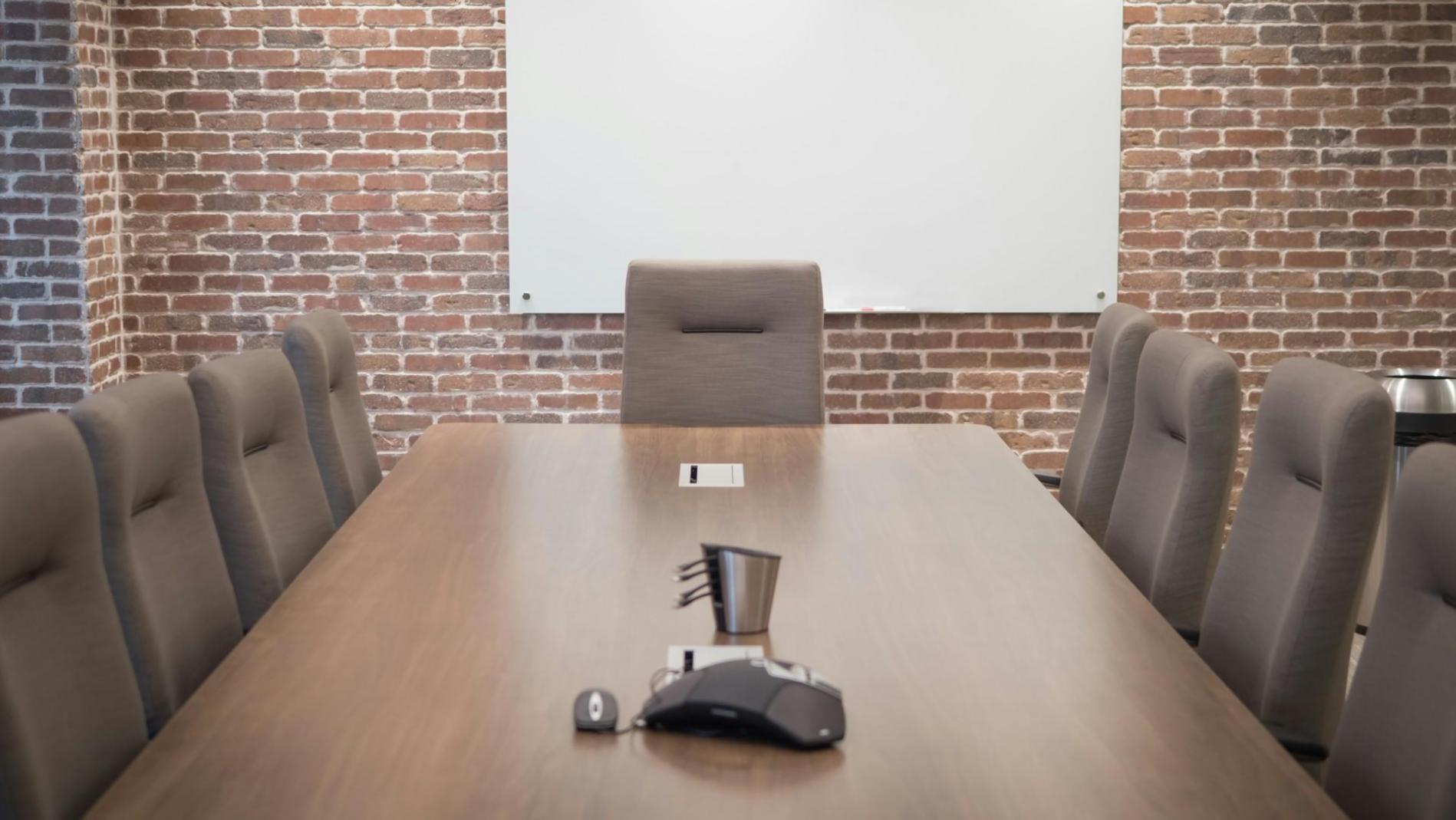 Business owner reviewing organized expense categories on tablet